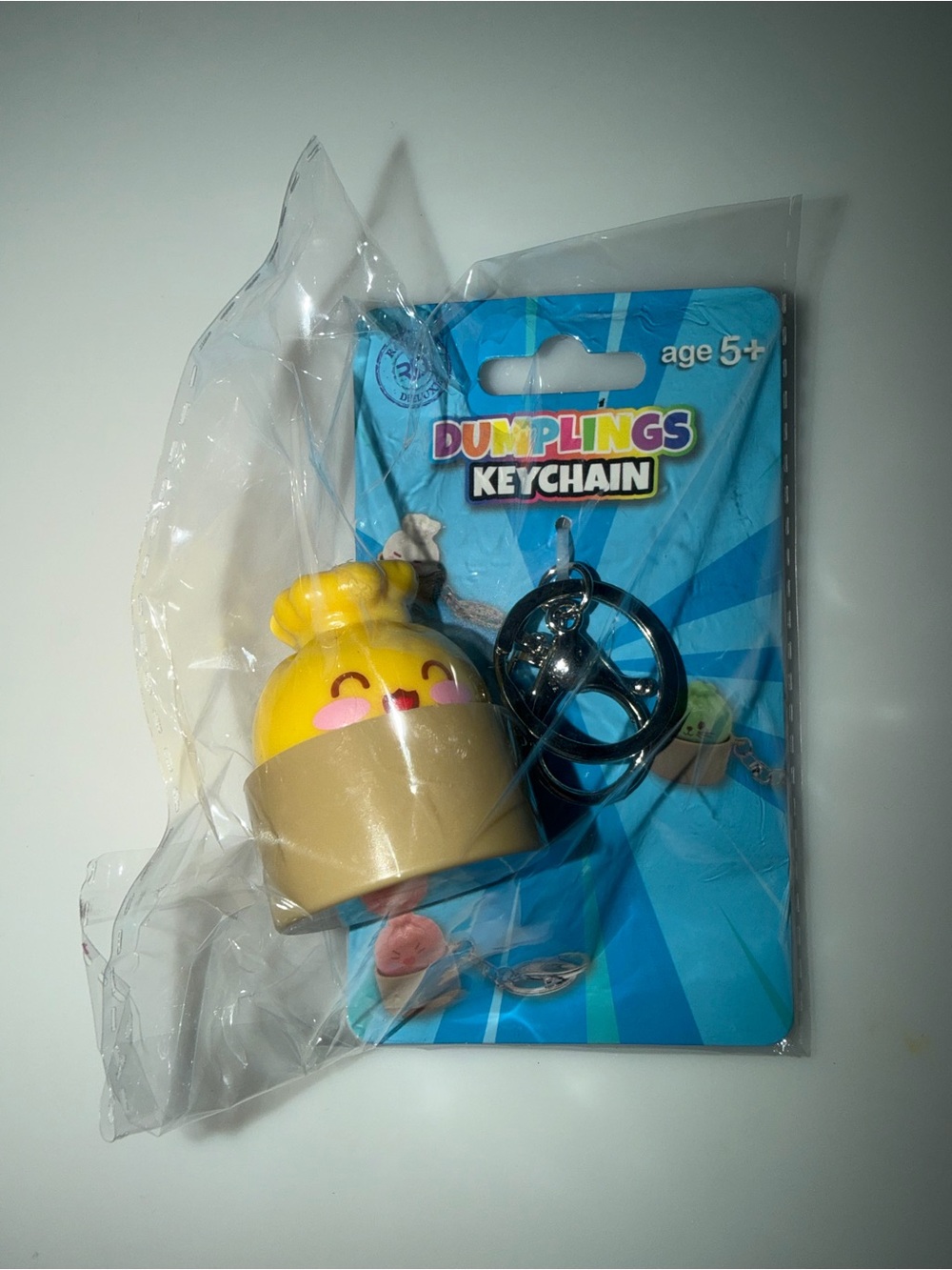 Yellow NWT Dumplings Keychain Squishy Viral Fidget Toy